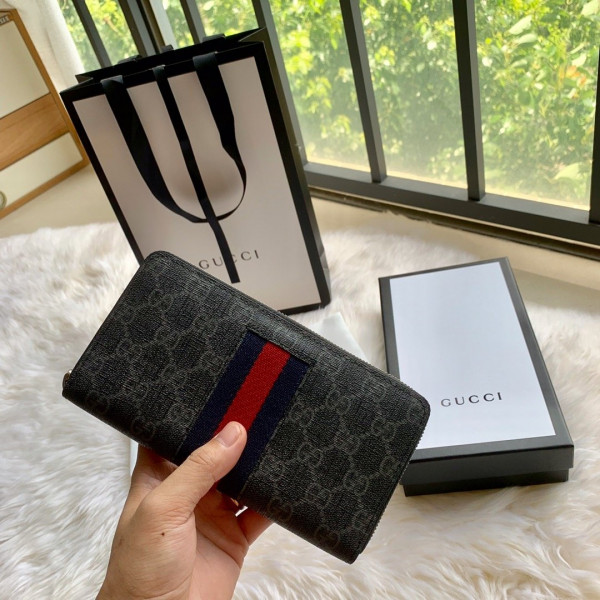 G*u*i leather zip around wallet