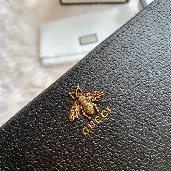 G*u*i leather zip around wallet