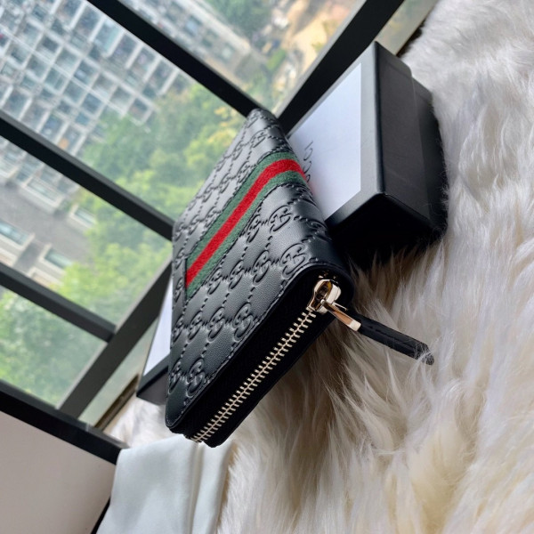 G*u*i leather zip around wallet