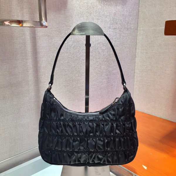 Pra*a nylon and saffiano leather mini bag