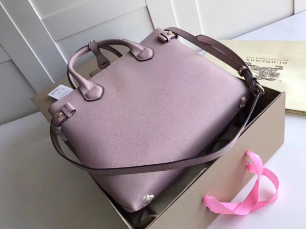 B**rry the medium banner in leather and house check