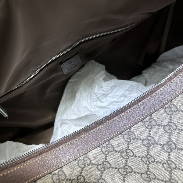 G*u*i medium duffle bag with web