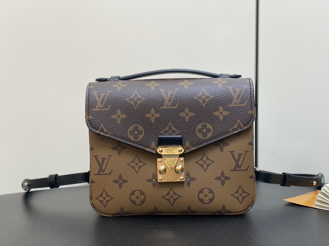 l0*is V*t0n pochette métis backpack